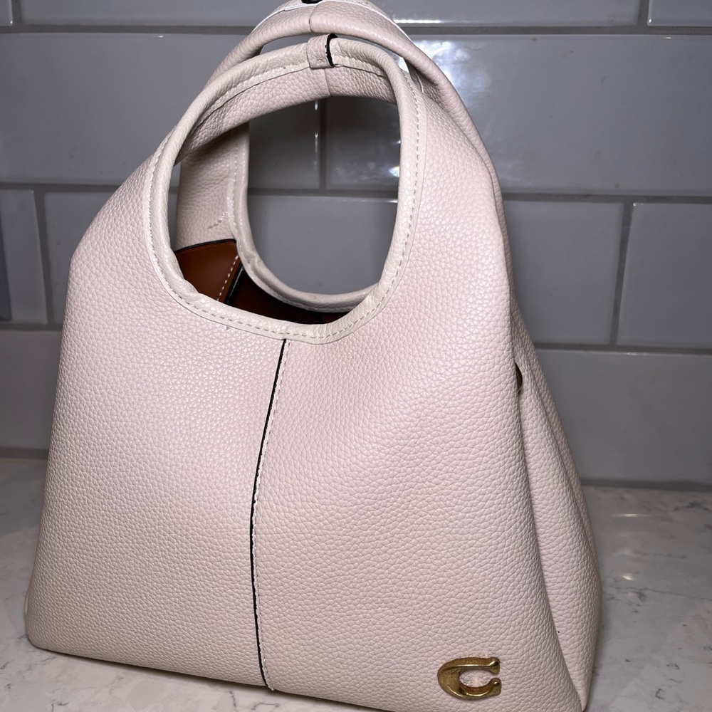 Elegant Cream Handbag